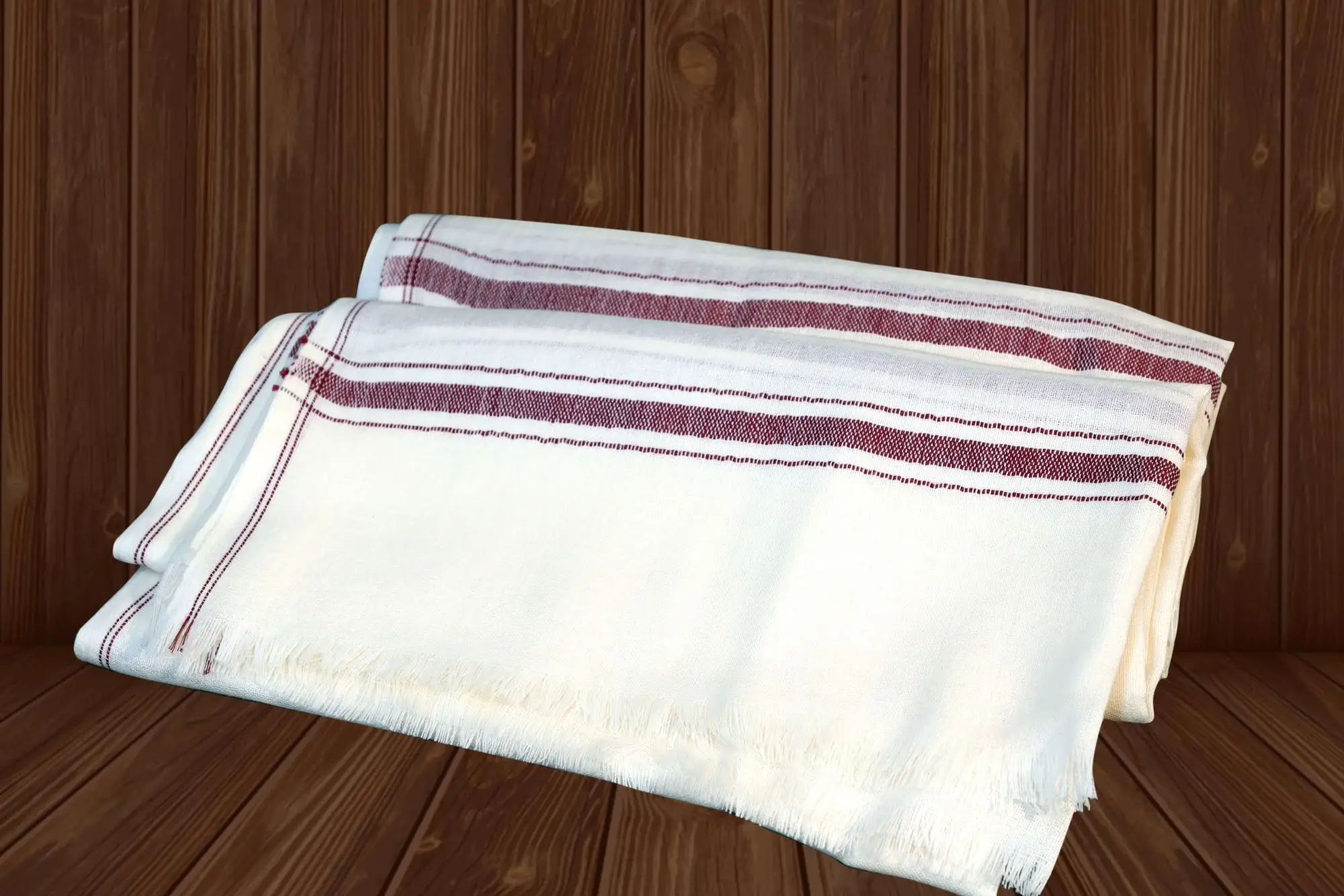 A stack of folded white cloths